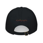 Black baseball cap with text 'the golden pumpkin' on the back, in rusty orange color. The golden pumpkin is the store name.